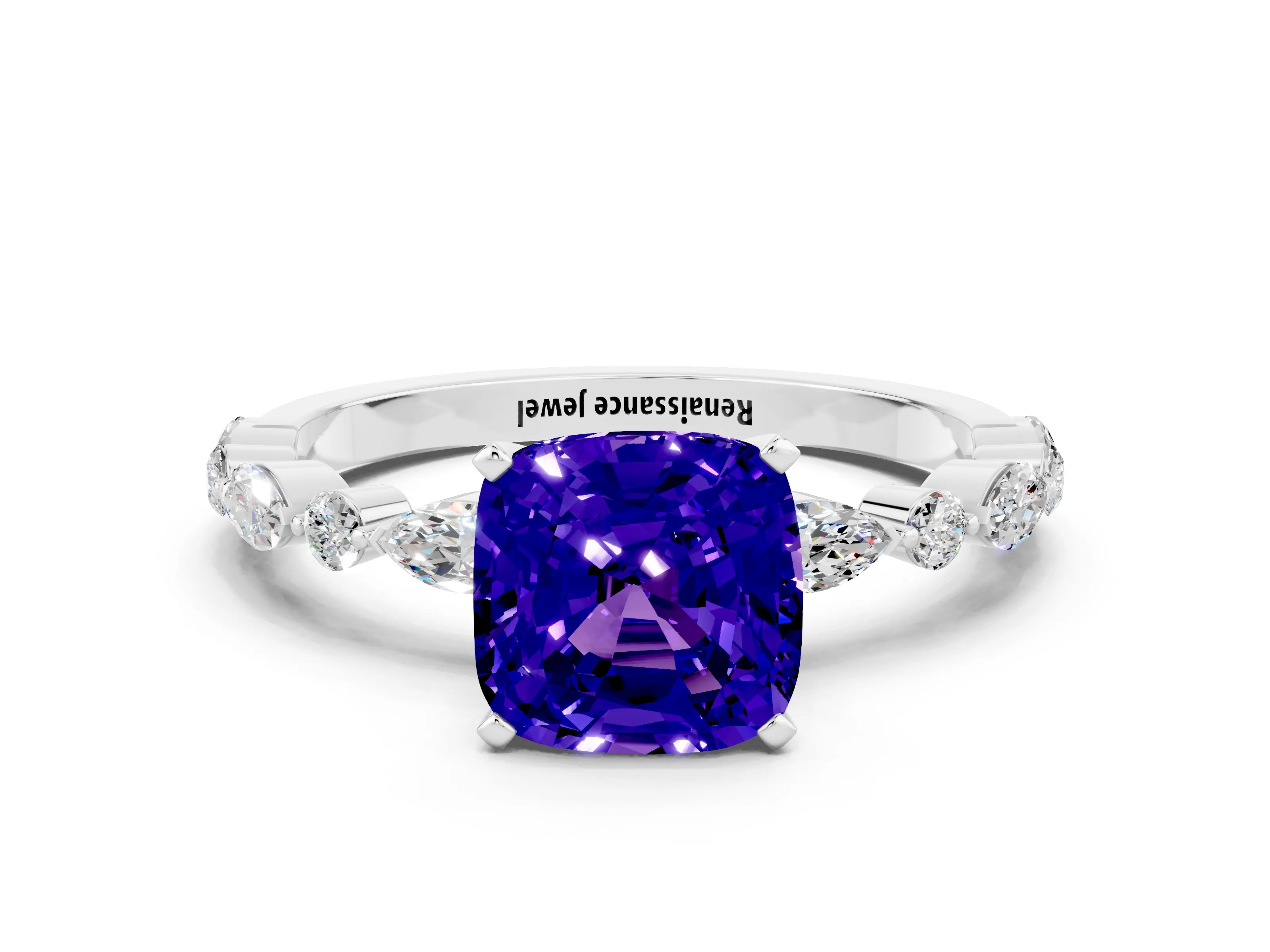 White gold Cushion Cut Tanzanite Solitaire with Side Stones on a Pavé Band and Four-Prong Setting