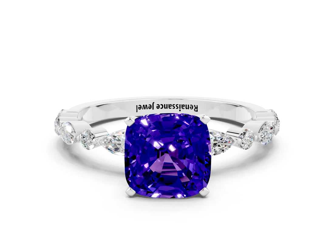 White gold Cushion Cut Tanzanite Solitaire with Side Stones on a Pavé Band and Four-Prong Setting