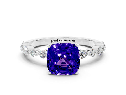 White gold Cushion Cut Tanzanite Solitaire with Side Stones on a Pavé Band and Four-Prong Setting