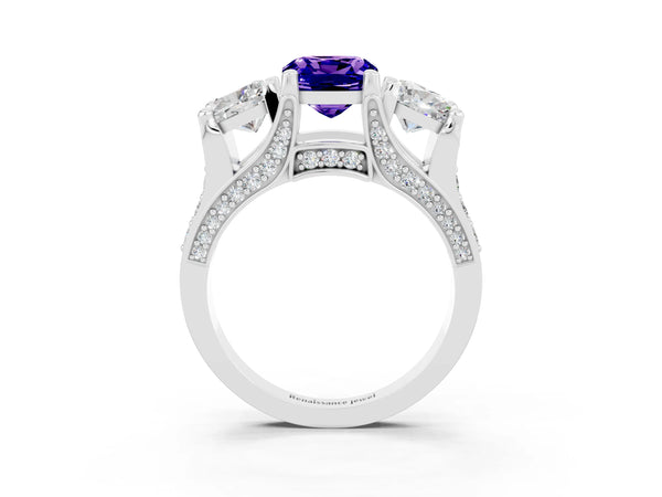 White gold Cushion Cut Tanzanite Three-Stone Ring with Channel Set Band and Four-Prong Setting