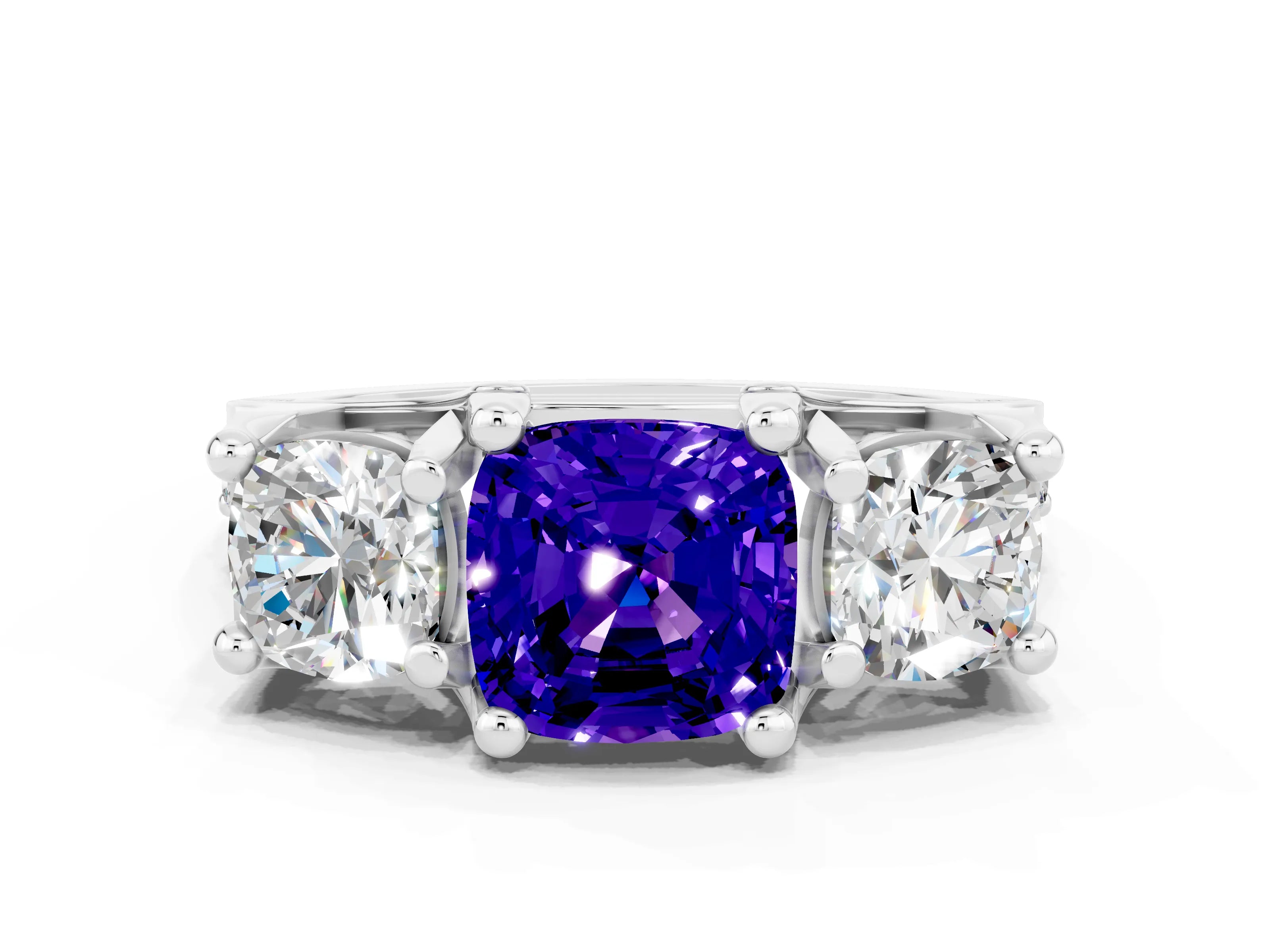 White gold Cushion Cut Tanzanite Three-Stone Ring with Channel Set Band and Four-Prong Setting