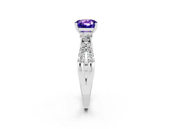 Platinum Cushion Cut Tanzanite Three-Stone Ring with Pavé Split Shank and Four-Prong Setting