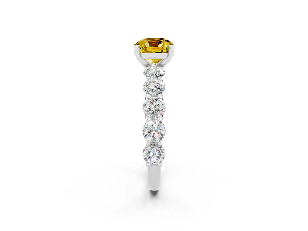Platinum Cushion Cut Yellow Sapphire Prong Setting with Side Stones on a Pave Band
