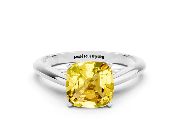 White gold Cushion Cut Yellow Sapphire Solitaire Engagement Ring with Cathedral Setting and Four-Prong Mount
