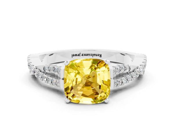 Platinum Cushion Cut Yellow Sapphire Solitaire Engagement Ring with Twisted Pavé Band and Four-Prong Setting