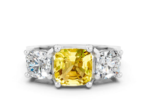 White gold Cushion Cut Yellow Sapphire Three-Stone Ring with Channel Set Band and Four-Prong Setting