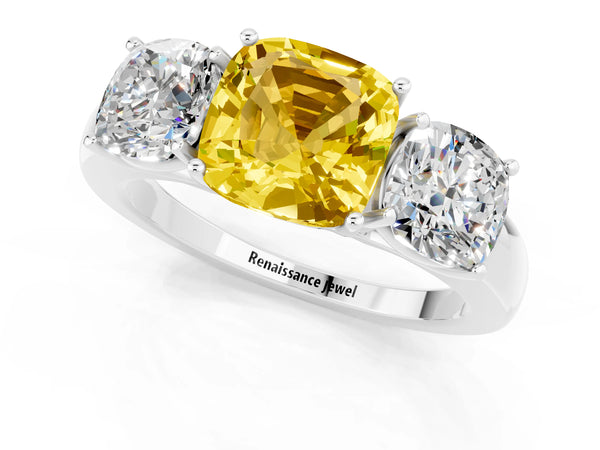 Platinum Cushion Cut Yellow Sapphire Three-Stone Ring with Four-Prong Setting and Classic Band