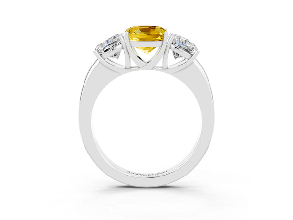Platinum Cushion Cut Yellow Sapphire Three-Stone Ring with Four-Prong Setting and Classic Band
