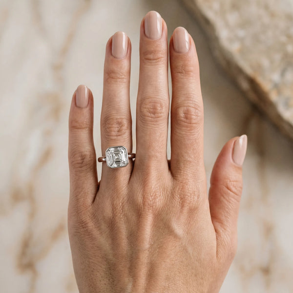 White gold Cushion Diamond Solitaire Ring with Bezel Setting and Classic Band