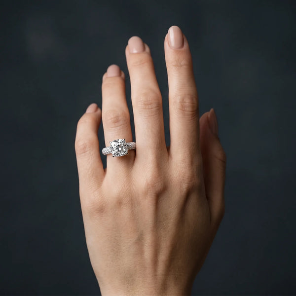White gold Cushion Diamond Solitaire Ring with Prong Setting and Pavé Band