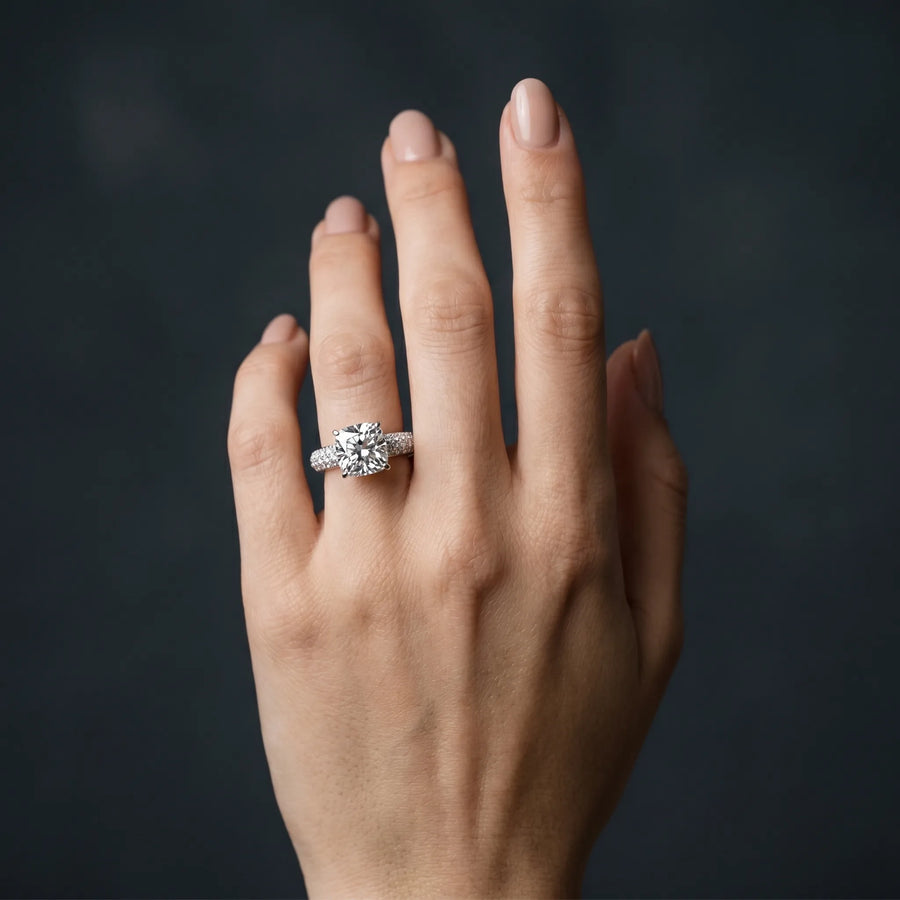 White gold Cushion Diamond Solitaire Ring with Prong Setting and Pavé Band