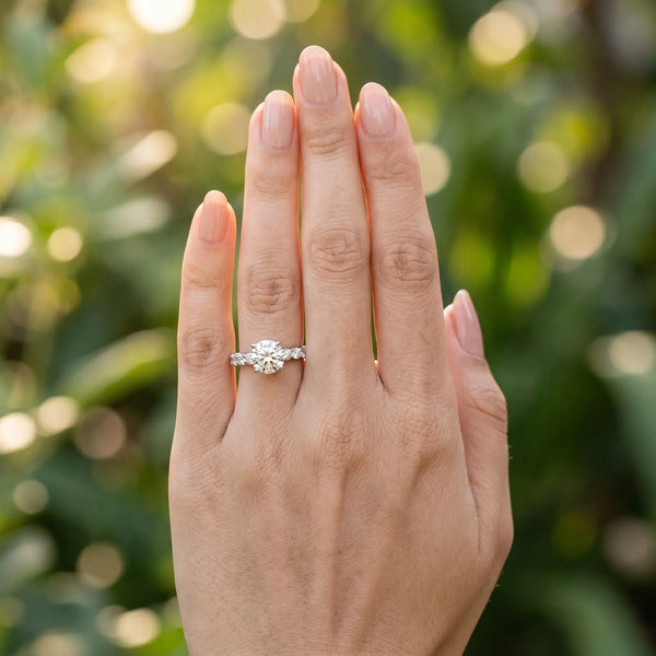 White gold Cushion Diamond Solitaire Ring with Shared Prong Round Side Stones