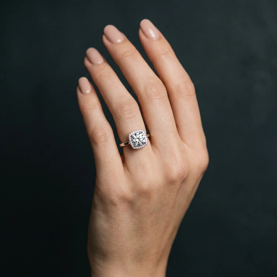 White gold Cushion Halo Solitaire Engagement Ring with Round Diamond and Four-Prong Setting