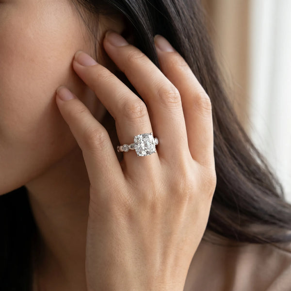 White gold Cushion Solitaire Bezel-Set Diamond Ring with Beaded Band and Four-Prong Setting