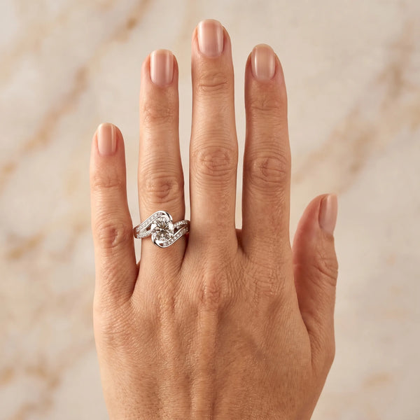 White gold Cushion Solitaire Bypass Diamond Engagement Ring with Channel-Set Band and Four-Prong Setting