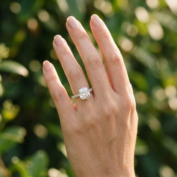 White gold Cushion Solitaire Diamond Engagement Ring with Pavé Band and Six-Prong Setting