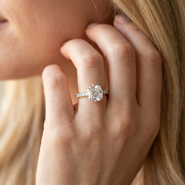White gold Cushion Solitaire Diamond Engagement Ring with Pavé Band and Six-Prong Setting