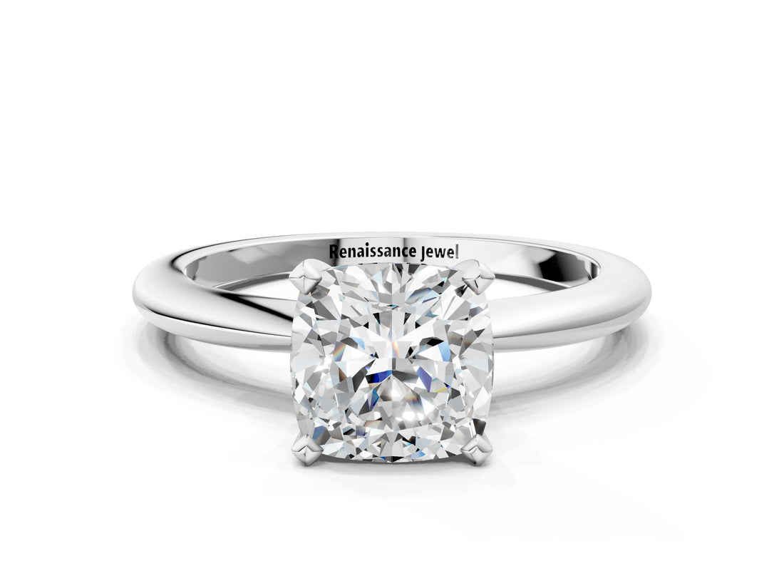 White gold Cushion Solitaire Diamond Ring with Six-Prong Setting on a Classic Band