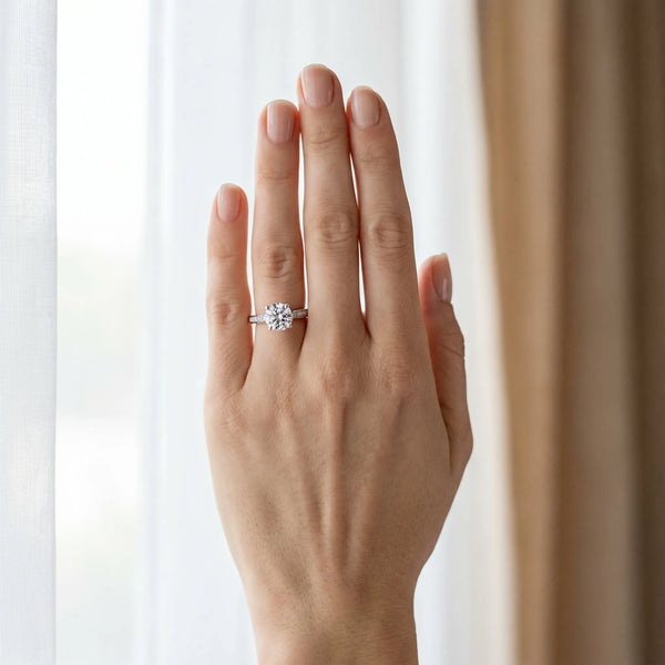White gold Cushion Solitaire Prong Set Diamond Engagement Ring with Pave Band