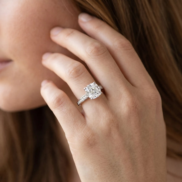 White gold Cushion Solitaire Prong Set Diamond Engagement Ring with Pave Band