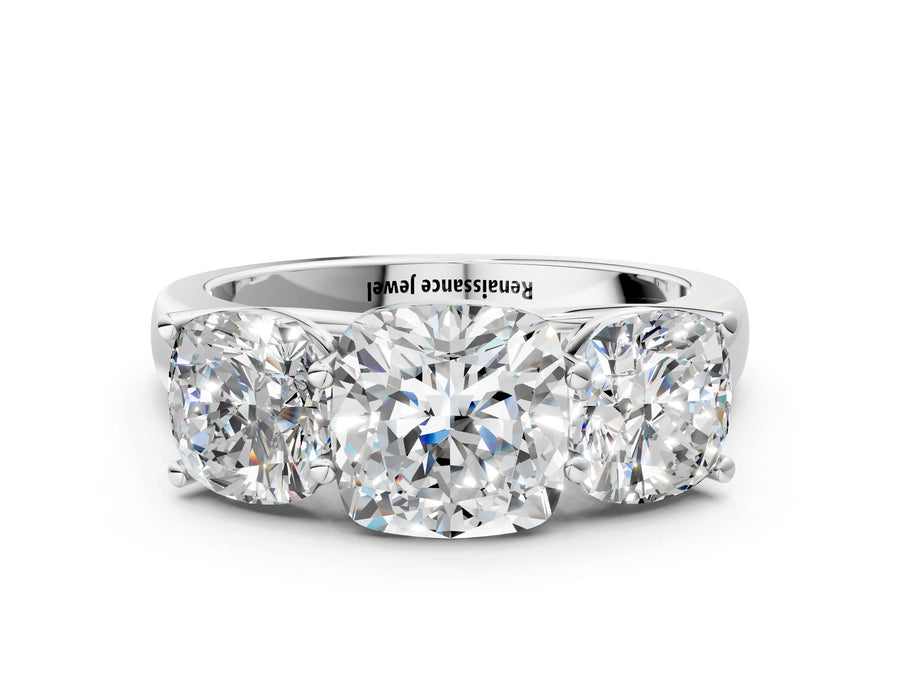 White gold Cushion Three-Stone Diamond Ring with Prong Setting on a Classic Band