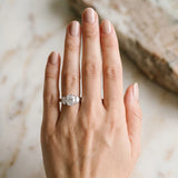 White gold Cushion Three-Stone Diamond Ring with Prong Setting on a Classic Band_3