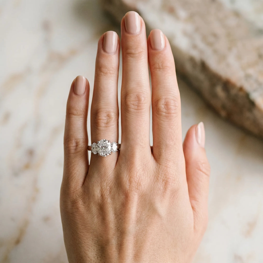 White gold Cushion Three-Stone Diamond Ring with Prong Setting on a Classic Band_3