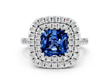 White gold Double Halo Cushion Cut Blue Sapphire Pavé Band with Four-Prong Setting