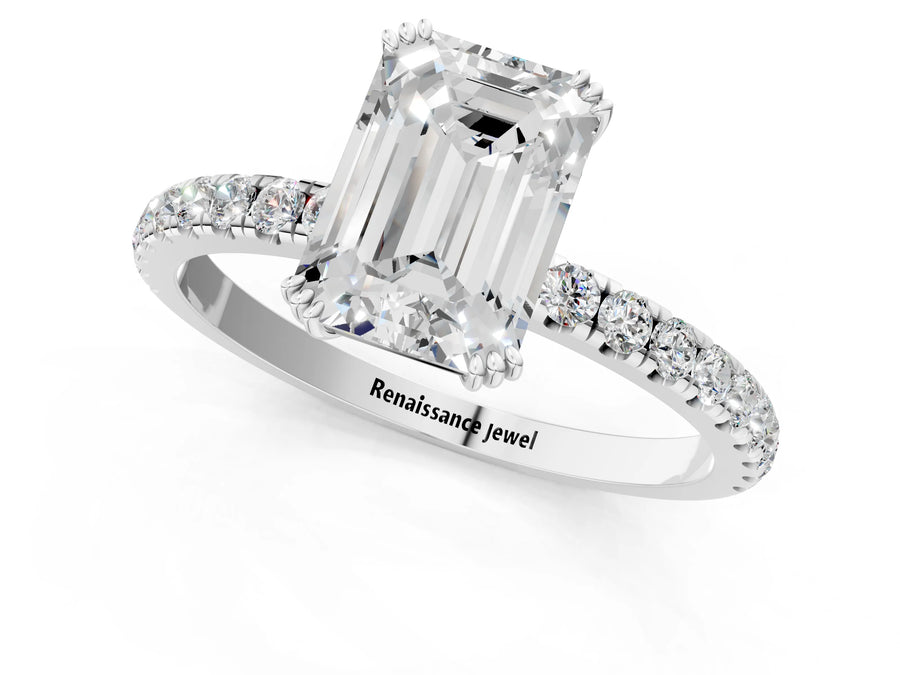 White gold Emerald Brilliant Solitaire with Pavé Band and Claw Prong Setting