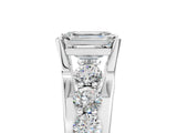 White gold Emerald Brilliant Solitaire with Side Stones on a Pave Band and Four-Prong Setting_67