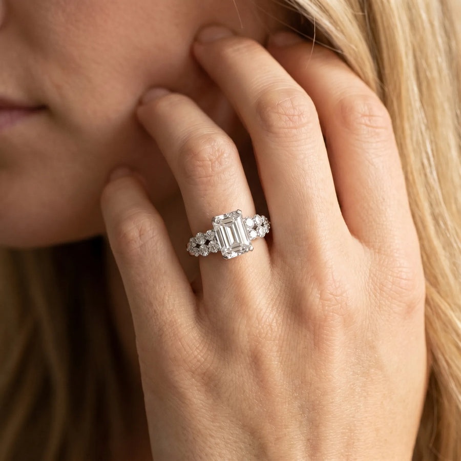 White gold Emerald Cluster Diamond Engagement Ring with Pavé Band and Four-Prong Setting