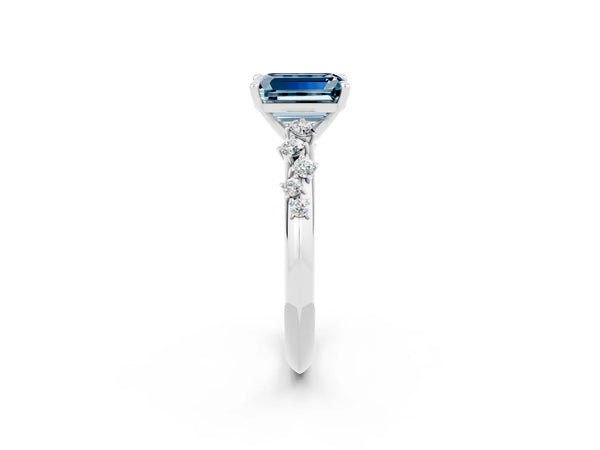 Platinum Emerald Cut Aquamarine Cluster Side Stone Solitaire Ring with Prong Setting