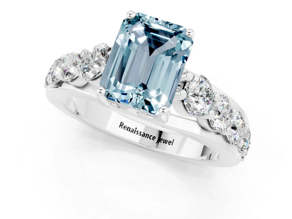 Platinum Emerald Cut Aquamarine Engagement Ring with Pavé Band and Four-Prong Setting