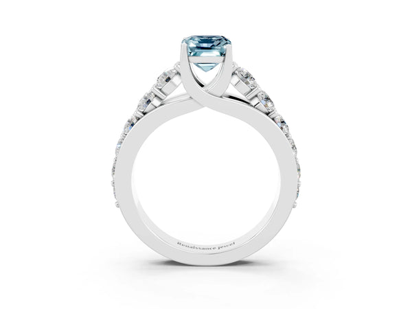 Silver Emerald Cut Aquamarine Engagement Ring with Pavé Band and Four-Prong Setting