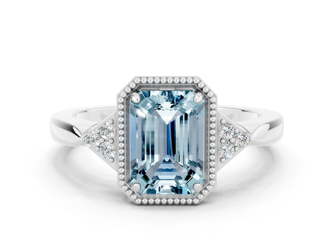 White gold Emerald Cut Aquamarine Halo Ring with Tapered Band and Four-Prong Setting