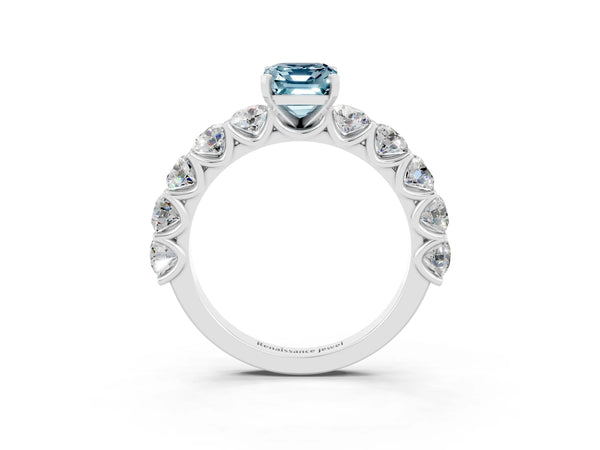 Silver Emerald Cut Aquamarine Prong Setting with Side Stones on a Pave Band