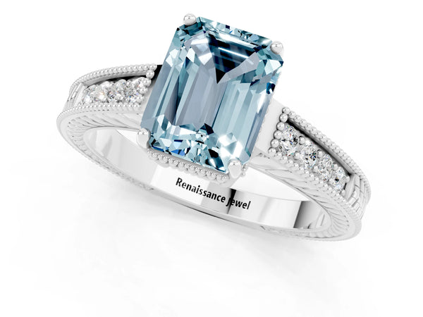 Platinum Emerald Cut Aquamarine Ring with Milgrain Pavé Band and Four-Prong Setting