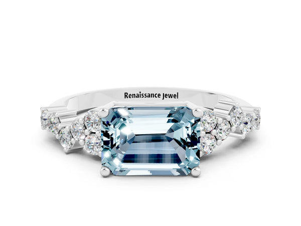 Platinum Emerald Cut Aquamarine Scattered Round Accent Ring with Prong Setting