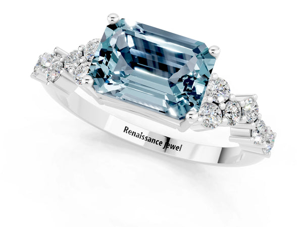 Platinum Emerald Cut Aquamarine Scattered Round Accent Ring with Prong Setting