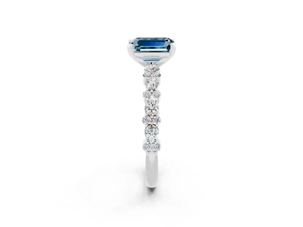 White gold Emerald Cut Aquamarine Side Stone Solitaire Ring with Round  and Four-Prong Setting