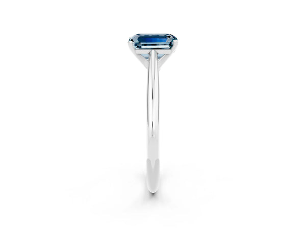 White gold Emerald Cut Aquamarine Solitaire Engagement Ring with Cathedral Setting and Four-Prong Mount