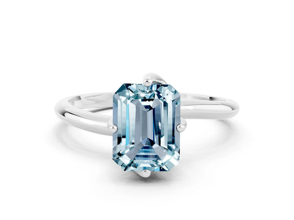 Silver Emerald Cut Aquamarine Solitaire Engagement Ring with Four-Prong Setting and Classic Band