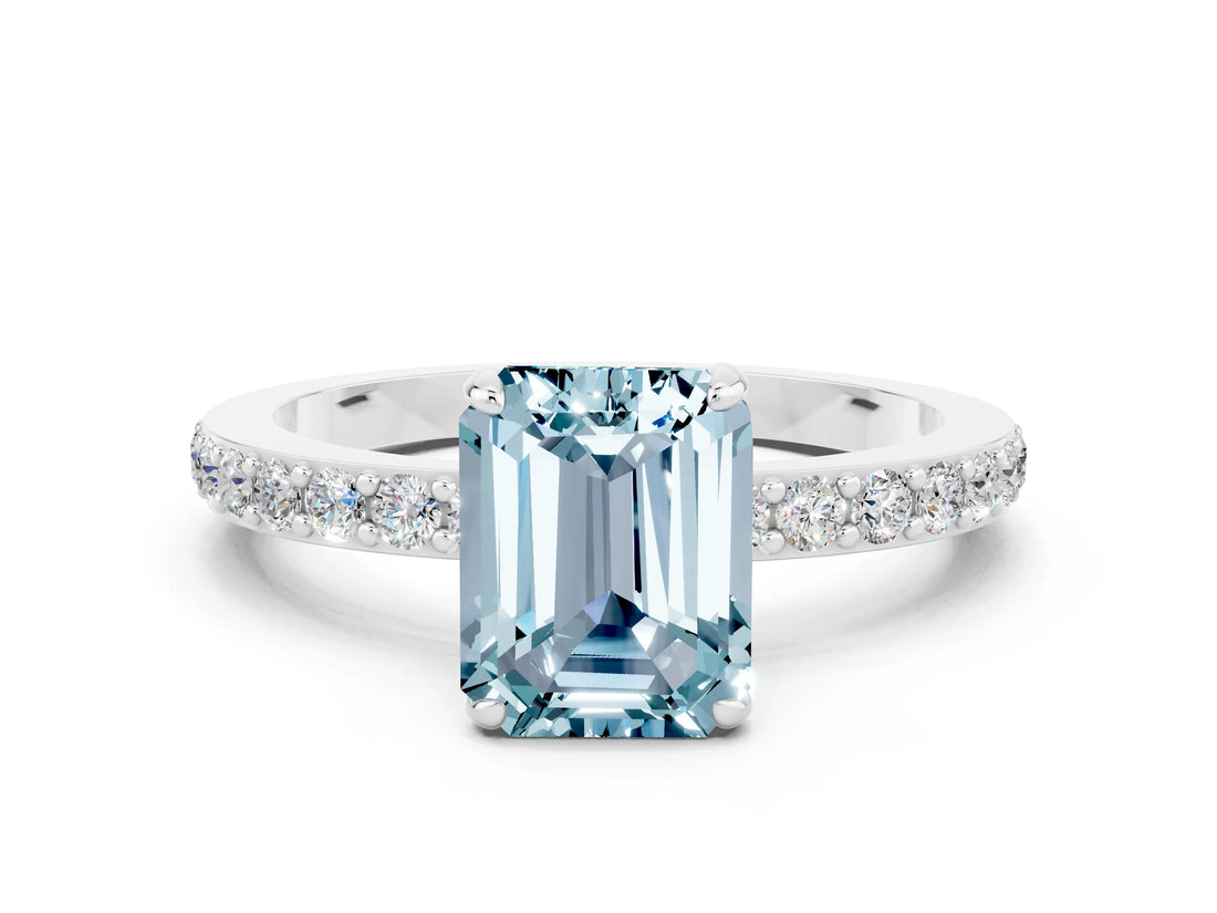 White gold Emerald Cut Aquamarine Solitaire Engagement Ring with Pavé Band and Four-Prong Setting