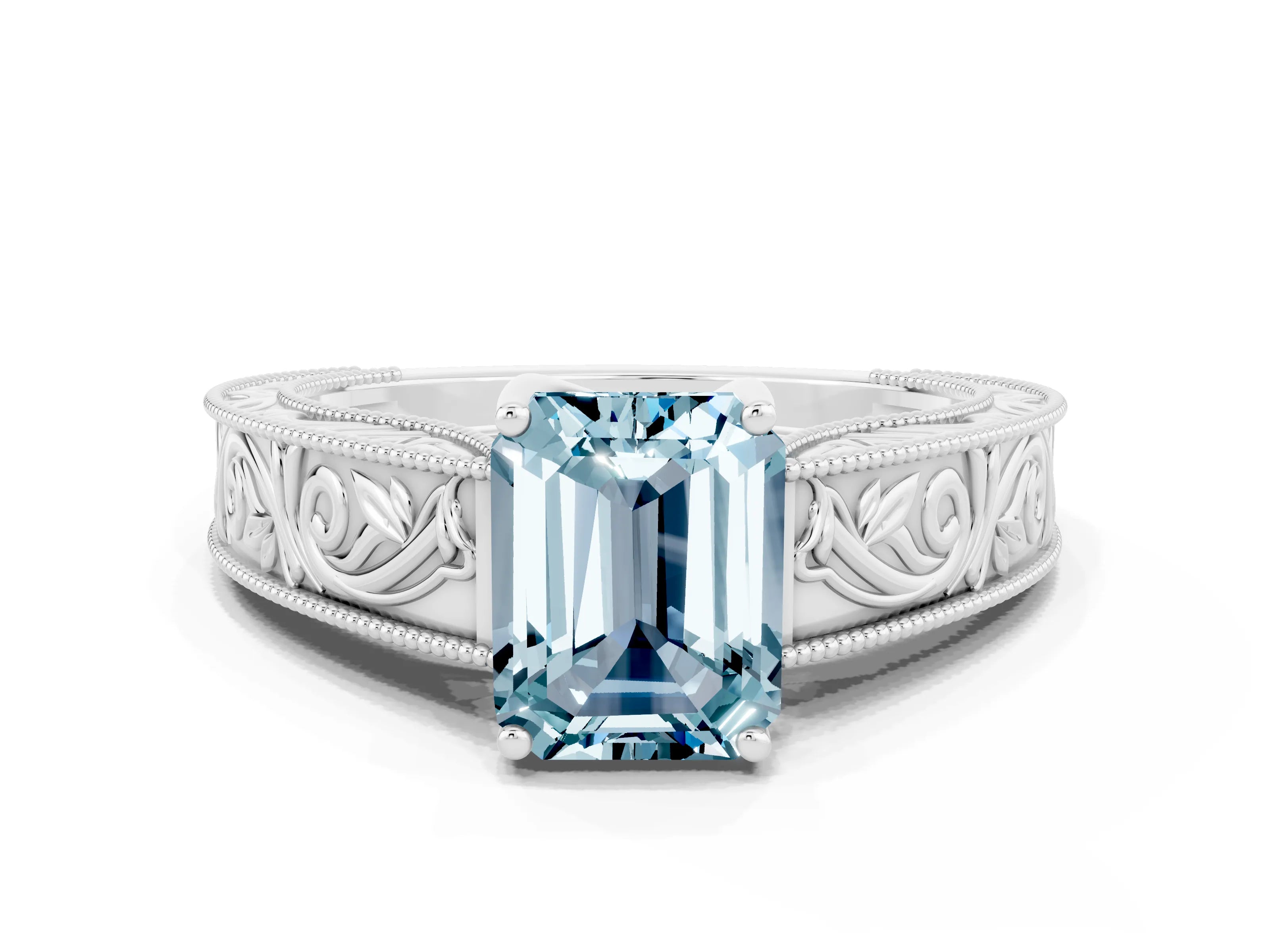 White gold Emerald Cut Aquamarine Solitaire Ring with Engraved Band and Four-Prong Setting