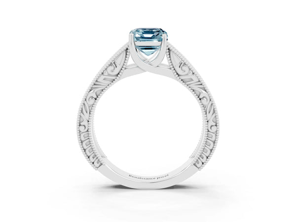 White gold Emerald Cut Aquamarine Solitaire Ring with Engraved Band and Four-Prong Setting