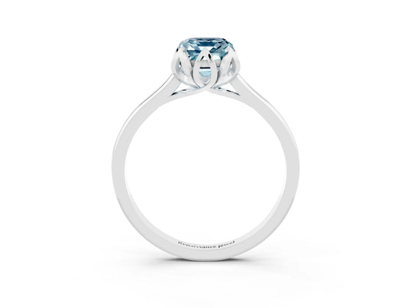 Platinum Emerald Cut Aquamarine Solitaire Ring with Flower Prong Setting and Classic Band