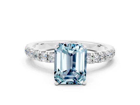 White gold Emerald Cut Aquamarine Solitaire Ring with Pavé Accents and Four-Prong Setting