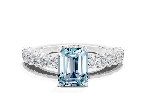 Platinum Emerald Cut Aquamarine Solitaire Ring with Shared Prong Pavé Band and Four-Prong Setting