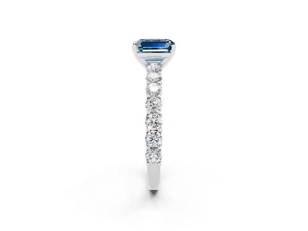 Silver Emerald Cut Aquamarine Solitaire Ring with Shared Prong Pavé Band and Four-Prong Setting