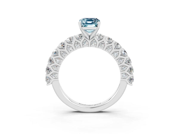 Platinum Emerald Cut Aquamarine Solitaire Ring with Shared Prong Pavé Band and Four-Prong Setting